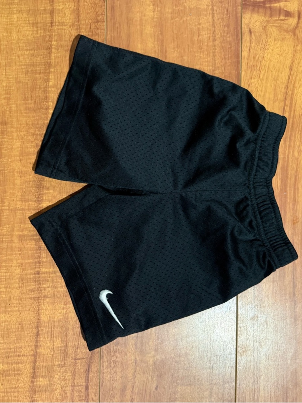 Nike Black Athletic Mesh Shorts with White Swoosh